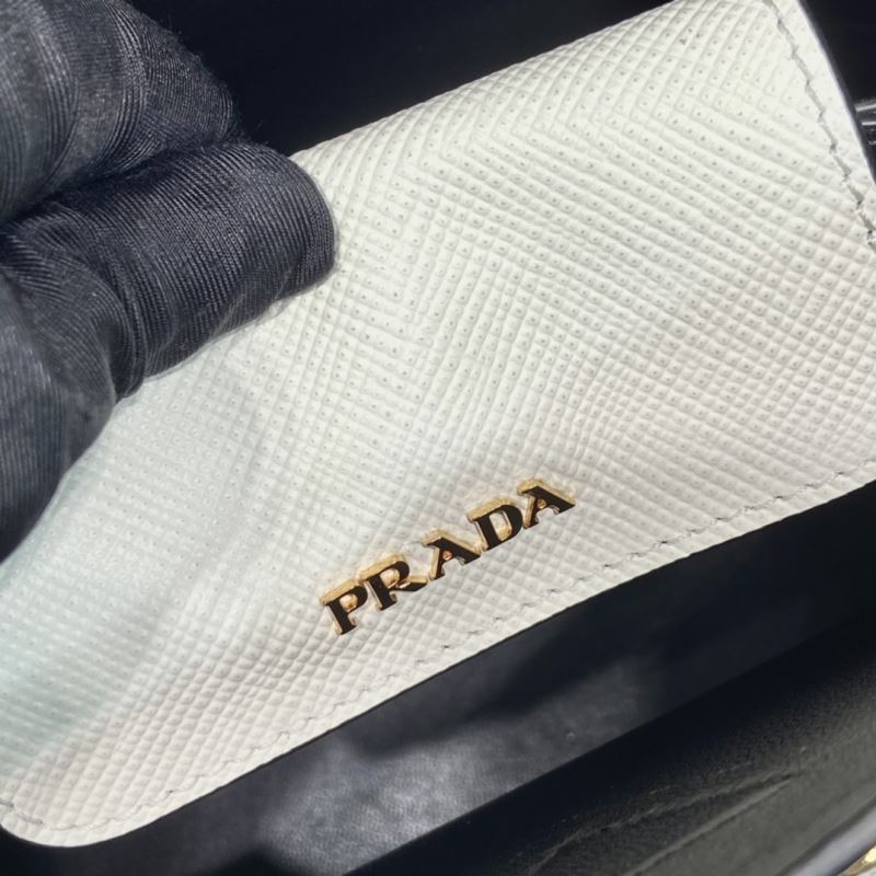 Pra*a top handle bags